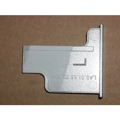Lewa zaślepka gniazda górnego zawiasu do lodówki i zamrażarki Amica M60 inox 8020553